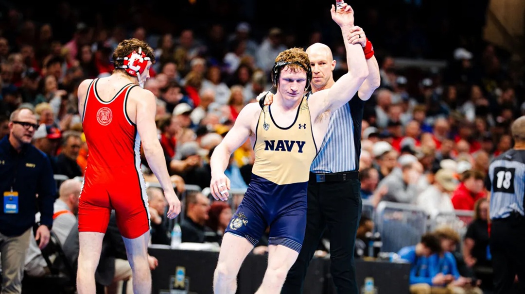 Navy's Danny Wask upends the No. 2 seed at 174lbs. Simon Ruiz (Cornell)